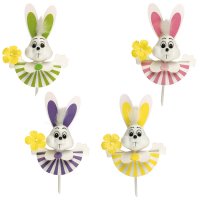 4 alegres conejos de Pascua en tallo