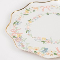 8 platos pequeños con motivos florales. n°1
