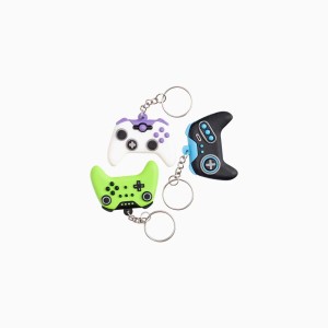 3 llaveros con forma de mando de videojuegos