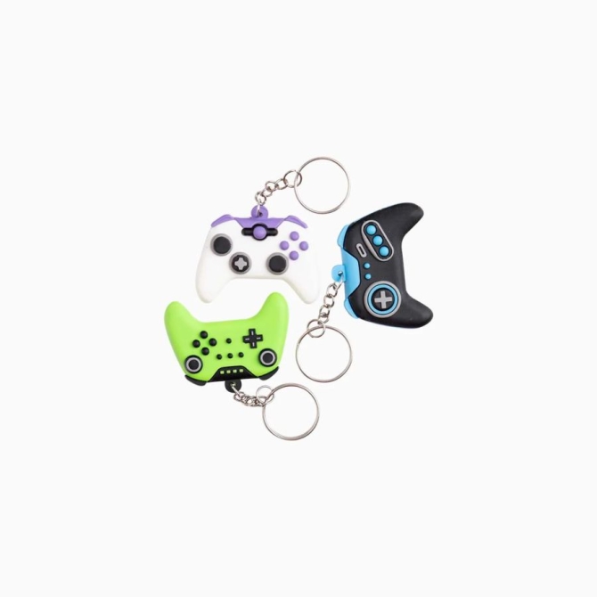 3 llaveros con forma de mando de videojuegos